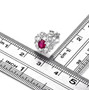 ruby and white zircon stud earrings in rhodium over sterling silver shown for size comparison