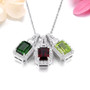 full view of garnet and white zircon pendant necklace in rhodium over sterling silver