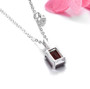 back view of garnet and white zircon pendant necklace in rhodium over sterling silver