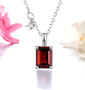 garnet and white zircon pendant necklace in rhodium over sterling silver shown in a lifestyle photo