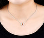 citrine and white zircon halo cuban link necklace in rhodium over sterling silver worn around the neck