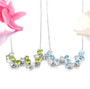 full view of peridot and white zircon necklace in rhodium over sterling silver