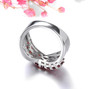 back view of garnet and white zircon crossover band ring in rhodium over sterling silver