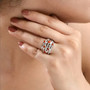 mediterranean coral and white zircon multi row band ring worn on a hand