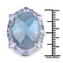 labradorite and tanzanite halo ring in rhodium over sterling silver shown for size comparison