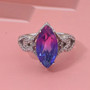 quartz triplet and white zircon ring in rhodium over sterling silver shown in a lifestyle photo