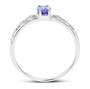 side view of tanzanite and diamond ring in solid 14k white gold