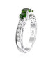 side view of chrome diopside and white zircon trilogy ring in rhodium over sterling silver