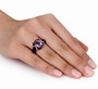 amethyst and diamond ring in black and white rhodium over sterling silver worn on a hand