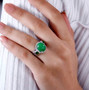 green jade and multi gemstone halo ring in rhodium over sterling silver worn on a hand
