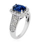 side view of ceylon blue sapphire and diamond halo wedding ring in 14k white gold