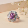 kunzite and moissanite double halo ring in 18k rose gold over sterling silver shown in a lifestyle photo