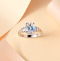 rainbow moonstone and diamond ring in solid 950 platinum shown in a lifestyle photo