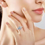 rainbow moonstone and diamond ring in solid 950 platinum worn on a hand