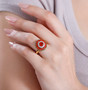 fire opal chrome diopside and moissanite halo cluster ring in rhodium over sterling silver worn on a hand