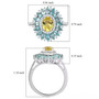 yellow apatite blue apatite and white zircon halo ring in rhodium over sterling silver shown for size comparison