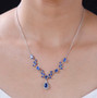 kyanite and white zircon necklace in rhodium over sterling silver worn around the neck