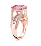 side view of pink and white moissanite and pink sapphire bridge ring in 18k rose gold over sterling silver