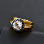 petalite and blue sapphire gents ring in 18k yellow gold over sterling silver shown in a lifestyle photo