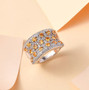 spessartine garnet and white zircon cluster ring in rhodium over sterling silver shown in a lifestyle photo
