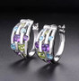 close up of peridot amethyst and blue topaz hoop earrings in rhodium over sterling silver