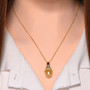 golden south sea pearl yellow sapphire and zircon pendant necklace in 18k yellow gold over sterling silver worn around the neck