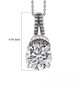 moissanite and green sapphire pendant necklace in rhodium over sterling silver shown for size comparison