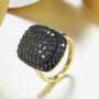 black spinel cluster ring in 14k yellow gold over sterling silver shown in a lifestyle photo