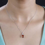 orange kyanite and white zircon pendant necklace in rhodium over sterling silver worn around the neck
