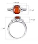 orange kyanite and white zircon ring in rhodium over sterling silver shown for size comparison