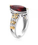 side view of marquise garnet solitaire ring in 18k yellow gold and rhodium over sterling silver