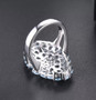 sky blue topaz cluster ring in rhodium over sterling silver