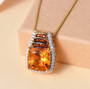 citrine fire opal and moissanite pendant necklace in 18k yellow gold over sterling silver shown in a lifestyle photo