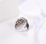 close up of garnet and white zircon cluster ring in rhodium over sterling silver