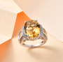 citrine and white zircon ring in rhodium over sterling silver shown in a lifestyle photo