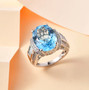 sky blue topaz and white zircon ring in rhodium over sterling silver shown in a lifestyle photo