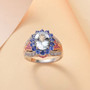 aquamarine multi gemstone ring in 18k rose gold and rhodium over sterling silver shown in a lifestyle photo