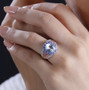 aquamarine multi gemstone ring in 18k rose gold and rhodium over sterling silver worn on a hand