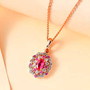 mahenge pink spinel pink sapphire and white zircon pendant necklace in 18k rose gold over sterling silver shown in a lifestyle photo