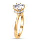side view of round moissanite solitaire ring in 18k yellow gold over sterling silver