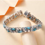 full view of larimar moonstone blue topaz and zircon cluster tennis bracelet in rhodium over sterling silver
