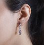 quartz doublet rhodolite garnet amethyst and zircon earrings in rhodium over sterling silver worn on the ear