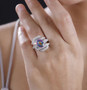 quartz doublet and white zircon ring in rhodium over sterling silver worn on a hand