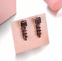 garnet or sky blue topaz dangle earrings in rhodium over sterling silver