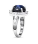 side view of star sapphire and moissanite halo moon and star ring in rhodium over sterling silver