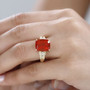 fire opal yellow and white diamond ring in solid 10k yellow gold worn on a hand