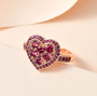 rhodolite garnet heart cluster ring in 18k rose gold over sterling silver shown in a lifestyle photo