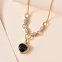 London-blue-topaz-heart-necklace-live-GGS1286