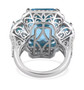 back view of sky blue topaz and white zircon three stone halo ring in rhodium over sterling silver