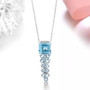 close up of sky blue topaz or garnet necklace in rhodium over sterling silver